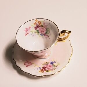 Miniature teacup and saucer made in occupied Japan